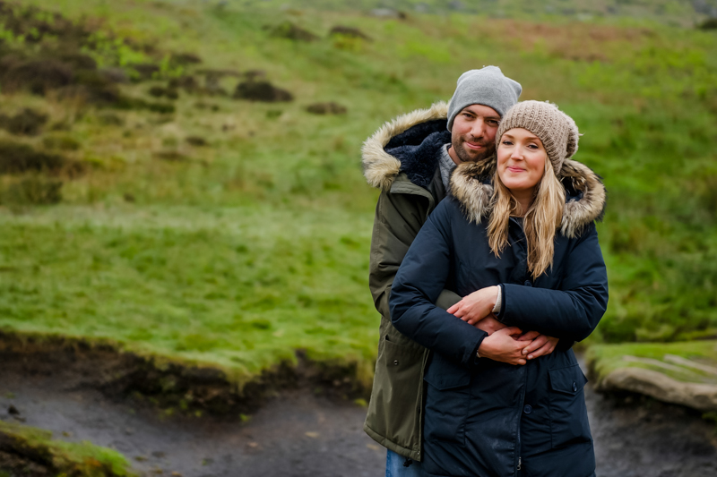 couple smiling winter engaged at Peak District taken by Victoria La Bouchardiere