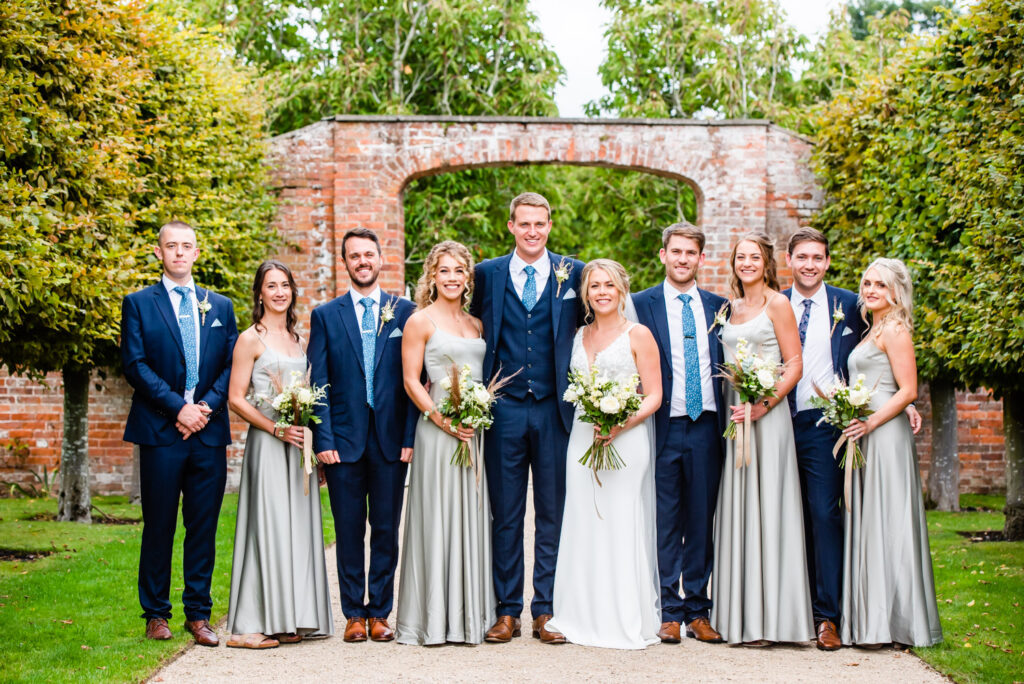 bridal party and groomsmen portrait at Combermere Abbey wedding venue