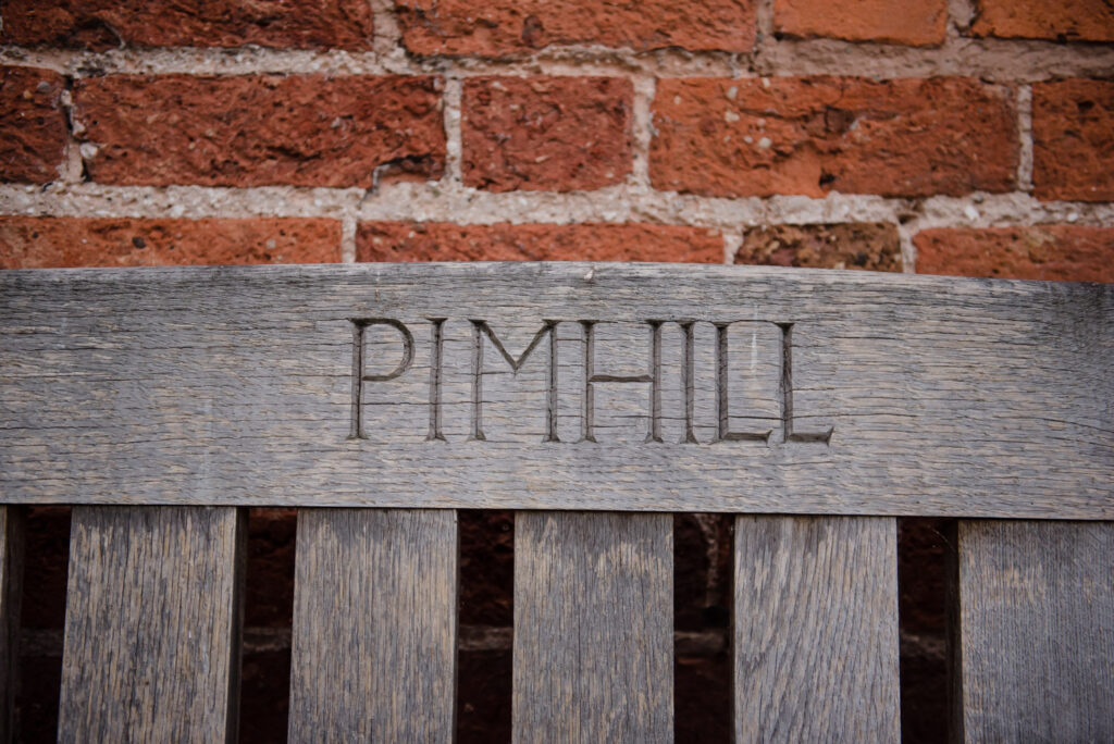 Pimhill engraved on wooden bench