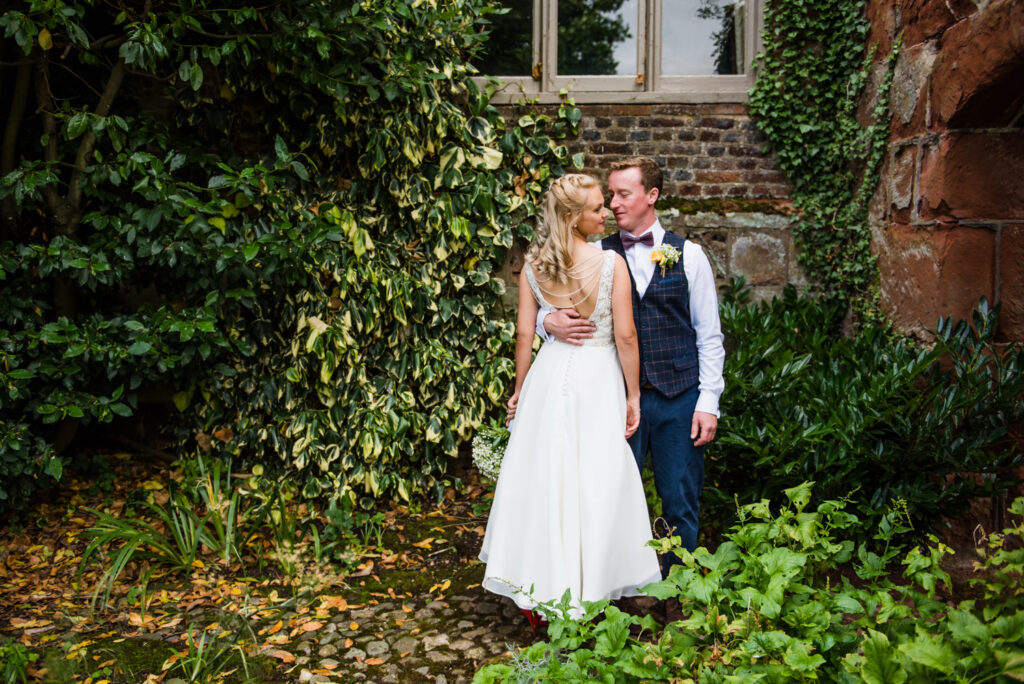 Bride and groom in private gardens at Pimhill barn taken by Shrewsbury wedding photographer Victoria La Bouchardiere